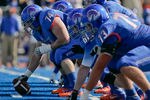 BOISE, ID - OCTOBER 01:  Cory Yriarte #74 of the Boise State Broncos prepares to snap the ball against the Nevada Wolf Pack at Bronco Stadium on October 1, 2011 in Boise, Idaho.  (Photo by Otto Kitsinger III/Getty Images)