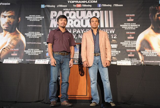 NEW YORK, NY - SEPTEMBER 06:  Professional Boxers Manny Pacquiao (L) and Juan Manuel Marquez attend the press conference for their World Welterweight Championship Fight at The Lighthouse at Chelsea Piers on September 6, 2011 in New York City.  (Photo by Michael Loccisano/Getty Images)