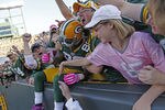 GREEN BAY, WI - OCTOBER 2: James Jones #89 of the Green Bay Packers does a Lambeau Leap after scoring a touchdown against the Denver Broncos at Lambeau Field on October 2, 2011 in Green Bay, Wisconsin.  (Photo by Matt Ludtke /Getty Images)