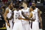 KANSAS CITY, MO - MARCH 10:  The Texas A&M Aggies huddle together during their quarterfinal game against the Missouri Tigers in the 2011 Phillips 66 Big 12 Men's Basketball Tournament at Sprint Center on March 10, 2011 in Kansas City, Missouri.  (Photo by Jamie Squire/Getty Images)