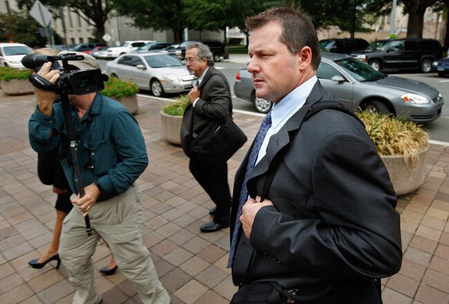 WASHINGTON, DC - SEPTEMBER 02:  Former all-star baseball pitcher Roger Clemens (R) arrives at the U.S. District Court for a hearing to decide whether the trial against the former Boston Red Sox and New York Yankees pitcher should be retried September 2, 2011 in Washington, DC.  The original trial against Clemens was declared a mistrial earlier this year after the judge said the prosecution presented inadmissible testimony that prejudiced the jury. A seven-time Cy Young Award winner, Clemens was on trial for making false statements, perjury and obstructing Congress when he testified about steroid use during a February 2008 inquiry by the House Oversight and Government Affairs.  (Photo by Chip Somodevilla/Getty Images)