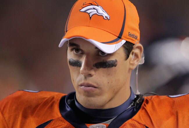 DENVER, CO - SEPTEMBER 12:  Quarterback Brady Quinn #9 of the Denver Broncos looks on from the bench against the Oakland Raiders at Sports Authority Field at Mile High on September 12, 2011 in Denver, Colorado. The Raiders defeated the Broncos 23-20.  (Photo by Doug Pensinger/Getty Images)