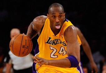 LOS ANGELES, CA - MAY 04:  Kobe Bryant #24 of the Los Angeles Lakers moves the ball against the Dallas Mavericks in Game Two of the Western Conference Semifinals in the 2011 NBA Playoffs at Staples Center on May 4, 2011 in Los Angeles, California. NOTE TO USER: User expressly acknowledges and agrees that, by downloading and or using this photograph, User is consenting to the terms and conditions of the Getty Images License Agreement.  (Photo by Kevork Djansezian/Getty Images)