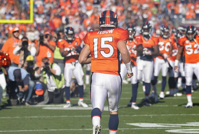 DENVER, CO - OCTOBER 30:  Quarterback Tim Tebow #15 of the Denver Broncos takes the field to face the Detroit Lions at Sports Authority at Invesco Field at Mile High on October 30, 2011 in Denver, Colorado. The Lions defeated the Broncos 45-10.  (Photo by Doug Pensinger/Getty Images)
