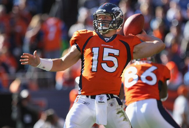 DENVER, CO - OCTOBER 30:  Quarterback Tim Tebow #15 of the Denver Broncos delivers a pass against the Detroit Lions at Sports Authority at Invesco Field at Mile High on October 30, 2011 in Denver, Colorado. The Lions defeated the Broncos 45-10.  (Photo by Doug Pensinger/Getty Images)