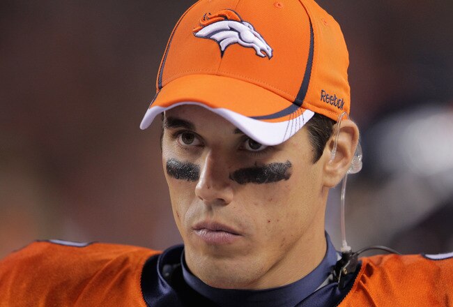DENVER, CO - SEPTEMBER 12:  Quarterback Brady Quinn #9 of the Denver Broncos looks on from the bench against the Oakland Raiders at Sports Authority Field at Mile High on September 12, 2011 in Denver, Colorado. The Raiders defeated the Broncos 23-20.  (Photo by Doug Pensinger/Getty Images)