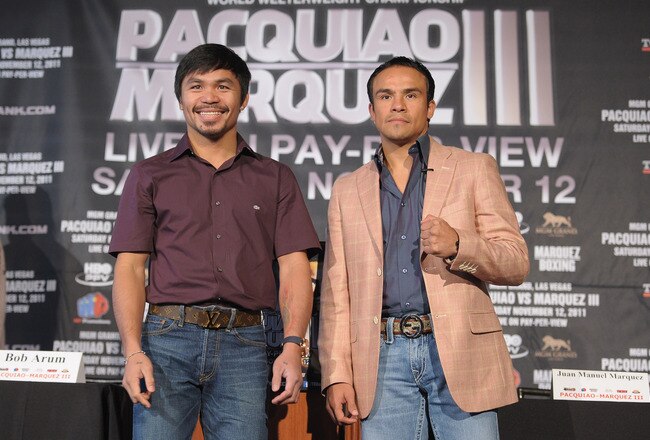 NEW YORK, NY - SEPTEMBER 06:  Professional Boxers Manny Pacquiao (L) and Juan Manuel Marquez attend the press conference for their World Welterweight Championship Fight at The Lighthouse at Chelsea Piers on September 6, 2011 in New York City.  (Photo by Michael Loccisano/Getty Images)