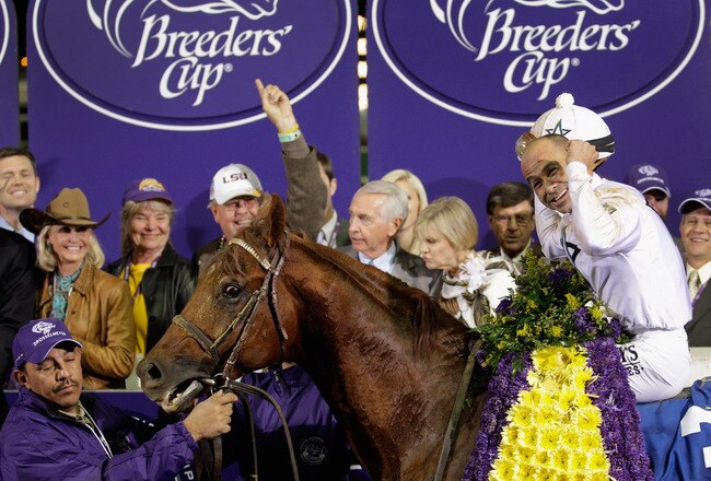 LOUISVILLE, KY - NOVEMBER 05:  Jockey Mike Smith celebrates in the winners circle after riding Drosselmeyer to victory to win the Breeders' Cup Classic during the 2011 Breeders' Cup World Championships at Churchill Downs on November 5, 2011 in Louisville, Kentucky.  (Photo by Rob Carr/Getty Images)