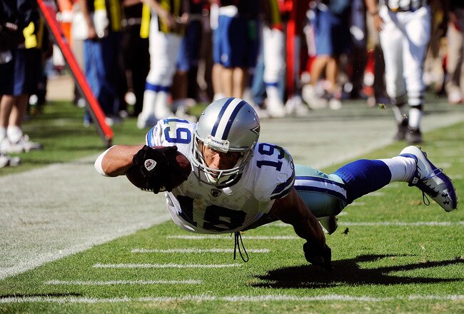 SAN FRANCISCO, CA - SEPTEMBER 18: Miles Austin #19 of the Dallas Cowboys dives into the endzone to finish off a 25 yard catch and run for a touchdown against the San Francisco 49ers in the fourth quarter of an NFL football game at Candlestick Park on September 18, 2011 in San Francisco, California.  (Photo by Thearon W. Henderson/Getty Images)