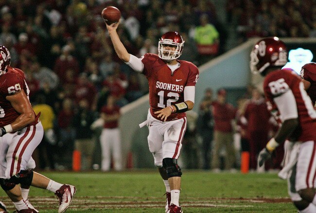 NORMAN, OK - OCTOBER 22:  Quarterback Landry Jones #12 of the Oklahoma Sooners looks to throw in the first half against theTexas Tech Red Raiders on at Gaylord Family-Oklahoma Memorial Stadium on October 22, 2011 in Norman, Oklahoma.  Oklahoma was upset by Texas Tech 41-38.  (Photo by Brett Deering/Getty Images)