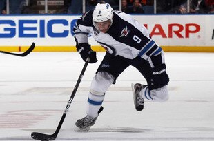 UNIONDALE, NY - NOVEMBER 03:  Evander Kane #9 of the Winnipeg Jets skates against the New York Islanders at the Nassau Veterans Memorial Coliseum on November 3, 2011 in Uniondale, New York. The Jets shut out the Islanders 3-0.  (Photo by Bruce Bennett/Getty Images)
