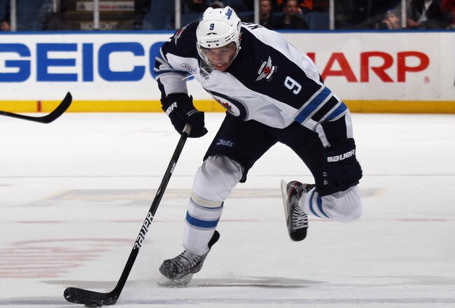UNIONDALE, NY - NOVEMBER 03:  Evander Kane #9 of the Winnipeg Jets skates against the New York Islanders at the Nassau Veterans Memorial Coliseum on November 3, 2011 in Uniondale, New York. The Jets shut out the Islanders 3-0.  (Photo by Bruce Bennett/Getty Images)
