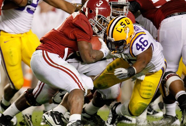 TUSCALOOSA, AL - NOVEMBER 05:  Trent Richardson #3 of the Alabama Crimson Tide is stopped by Kevin Minter #46 of the LSU Tigers during the game at Bryant-Denny Stadium on November 5, 2011 in Tuscaloosa, Alabama.  (Photo by Kevin C. Cox/Getty Images)