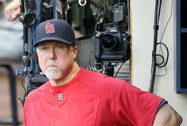 MILWAUKEE, WI - OCTOBER 09:  Hitting coach Mark McGwire of the St. Louis Cardinals during Game one of the National League Championship Series against the Milwaukee Brewers at Miller Park on October 9, 2011 in Milwaukee, Wisconsin.  The Brewers defeated the Cardinals 9-6.  (Photo by Christian Petersen/Getty Images)