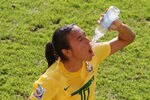DRESDEN, GERMANY - JULY 10:  Marta of Brazil cools herself down with water during the Women's World Cup Quarter Final match between Brazil and USA at Rudolf-Harbig Stadium on July 10, 2011 in Dresden, Germany.  (Photo by Scott Heavey/Getty Images)