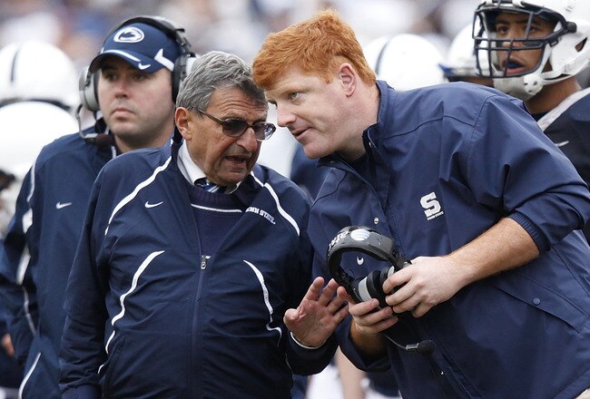 ORLANDO, FL - JANUARY 1: Head coach Joe Paterno of the Penn State Nittany Lions talks with offensive assistant coach Mike McQueary during the 2010 Capital One Bowl against the LSU Tigers at the Florida Citrus Bowl Stadium on January 1, 2010 in Orlando, Florida. Penn State won 19-17. (Photo by Joe Robbins/Getty Images)