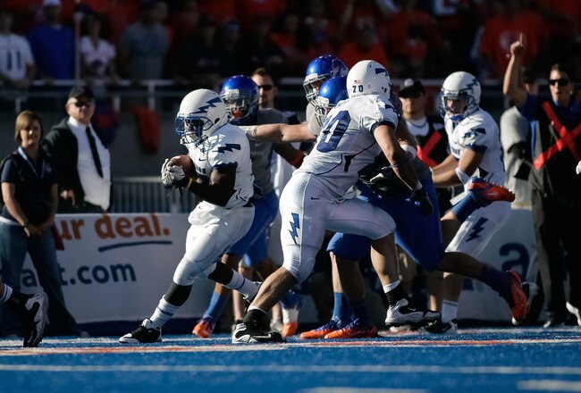 BOISE, ID - OCTOBER 22:  Asher Clark #17 of the Air Force Falcons runs the ball against the Boise State Broncos at Bronco Stadium on October 22, 2011 in Boise, Idaho.  (Photo by Otto Kitsinger III/Getty Images)