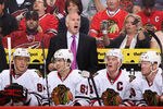 GLENDALE, AZ - OCTOBER 18:  Head coach Joel Quenneville of the Chicago Blackhawks reacts on the bench during the NHL game against the Phoenix Coyotes at Jobing.com Arena on October 18, 2011 in Glendale, Arizona. The Blackhawks defeated the Coyotes 5-2.  (Photo by Christian Petersen/Getty Images)