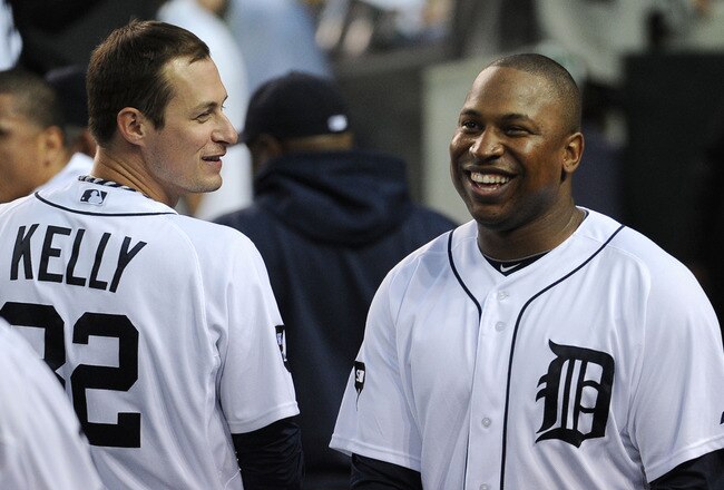 DETROIT, MI - OCTOBER 13:  Delmon Young #21 of the Detroit Tigers smiles with Don Kelly #32 in the sixth inning of Game Five of the American League Championship Series against the Texas Rangers at Comerica Park on October 13, 2011 in Detroit, Michigan.  (Photo by Harry How/Getty Images)