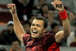 BEIJING, CHINA - OCTOBER 07:  Jo-Wilfried Tsonga of France celebrates his win over Juan Carlos Ferrero of Spain during the China Open at the National Tennis Center on October 7, 2011 in Beijing, China.  (Photo by Matthew Stockman/Getty Images)