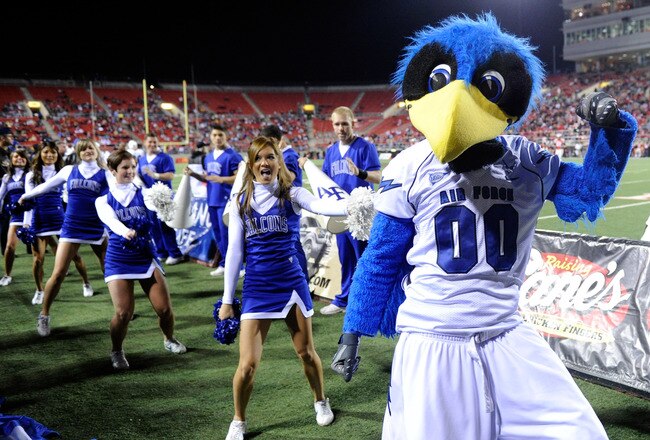 LAS VEGAS - NOVEMBER 18:  The Air Force Falcons mascot The Bird performs with cheerleaders during the team's game against the UNLV Rebels at Sam Boyd Stadium November 18, 2010 in Las Vegas, Nevada. Air Force won 35-20.  (Photo by Ethan Miller/Getty Images)