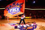 PHOENIX - DECEMBER 28:  The Phoenix Suns mascot 'Gorilla' waves a flag before the NBA game against the Los Angeles Lakers at US Airways Center on December 28, 2009 in Phoenix, Arizona.  The Suns defeated the Lakers 118-103. NOTE TO USER: User expressly acknowledges and agrees that, by downloading and or using this photograph, User is consenting to the terms and conditions of the Getty Images License Agreement.  (Photo by Christian Petersen/Getty Images)