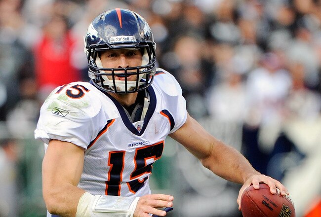 OAKLAND, CA - NOVEMBER 06: Tim Tebow #15 of the Denver Broncos scrambles with the ball looking for a receiver against the Oakland Raiders at O.co Coliseum on November 6, 2011 in Oakland, California.  (Photo by Thearon W. Henderson/Getty Images)