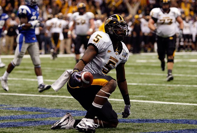 NEW ORLEANS - DECEMBER 20:  DeAndre Brown #5 of the Southern Miss Golden Eagles celebrates after catching a two point conversion pass against the Middle Tennessee Blue Raiders during the R+L Carriers New Orleans Bowl at the Louisiana Superdome on December 20, 2009 in New Orleans, Louisiana.  (Photo by Chris Graythen/Getty Images)