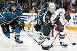 SAN JOSE, CA - JANUARY 22:  Antti Miettinen #20 of the Minnesota Wild and Joe Pavelski #8 of the San Jose Sharks at HP Pavilion on January 22, 2011 in San Jose, California.  (Photo by Ezra Shaw/Getty Images)