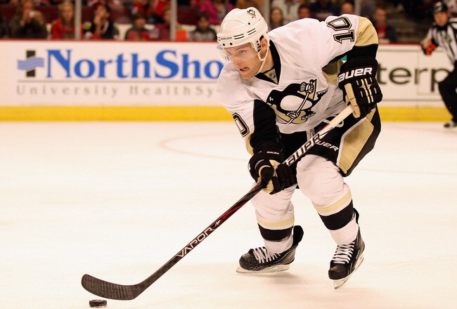 CHICAGO, IL - SEPTEMBER 30: Mark Letestu #10 of the Pittsburgh Penguins controls the puck against the Chicago Blackhawks during a preseason game at the United Center on September 30, 2011 in Chicago, Illinois. The Penguins defeated the Blackhawks 4-2.(Photo by Jonathan Daniel/Getty Images)