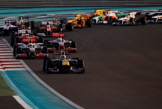 ABU DHABI, UNITED ARAB EMIRATES - NOVEMBER 14:  Sebastian Vettel of Germany and Red Bull Racing is pictured in the lead after the start during the Abu Dhabi Formula One Grand Prix at the Yas Marina Circuit on November 14, 2010 in Abu Dhabi, United Arab Emirates.  (Photo by Vladimir Rys/Getty Images)