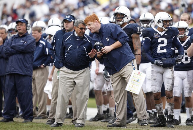 ORLANDO, FL - JANUARY 1: Head coach Joe Paterno of the Penn State Nittany Lions talks with offensive assistant coach Mike McQueary during the 2010 Capital One Bowl against the LSU Tigers at the Florida Citrus Bowl Stadium on January 1, 2010 in Orlando, Florida. Penn State won 19-17. (Photo by Joe Robbins/Getty Images)