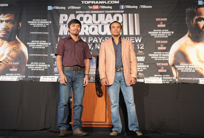 NEW YORK, NY - SEPTEMBER 06:  Professional Boxers Manny Pacquiao (L) and Juan Manuel Marquez attend the press conference for their World Welterweight Championship Fight at The Lighthouse at Chelsea Piers on September 6, 2011 in New York City.  (Photo by Michael Loccisano/Getty Images)