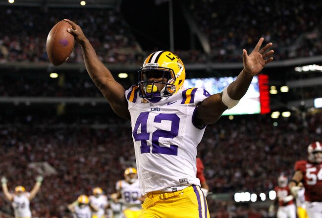 TUSCALOOSA, AL - NOVEMBER 05:  Michael Ford #42 of the LSU Tigers scores a touchdown in overtime that was called back after Ford stepped out of bounds against the Alabama Crimson Tide at Bryant-Denny Stadium on November 5, 2011 in Tuscaloosa, Alabama.  (Photo by Kevin C. Cox/Getty Images)