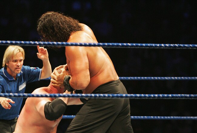 SYDNEY, AUSTRALIA - JUNE 15:  The Great Khali puts ECW Champion Kane into a vice grip during WWE Smackdown at Acer Arena on June 15, 2008 in Sydney, Australia.  (Photo by Gaye Gerard/Getty Images)