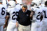 COLUMBUS, OH - NOVEMBER 13:  Head Coach Joe Paterno of the Penn State Nittany Lions pushes his way through a group of his players during a timeout in a game against the Ohio State Buckeyes at Ohio Stadium on November 13, 2010 in Columbus, Ohio.  (Photo by Jamie Sabau/Getty Images)