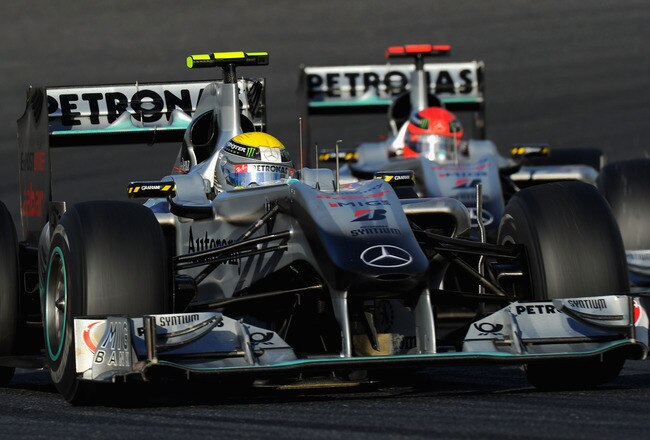 SUZUKA, JAPAN - OCTOBER 10:  Nico Rosberg of Germany and Mercedes GP leads from team mate Michael Schumacher of Germany and Mercedes GP during the Japanese Formula One Grand Prix at Suzuka Circuit on October 10, 2010 in Suzuka, Japan.  (Photo by Clive Mason/Getty Images)