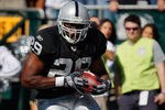 OAKLAND, CA - OCTOBER 23: Running back Michael Bush #29 of the Oakland Raiders looks for an opening against the Kansas City Chiefs on October 23, 2011 at O.co Coliseum in Oakland, California. The Chiefs won 28-0. (Photo by Brian Bahr/Getty Images)