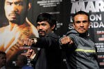 LAS VEGAS, NV - NOVEMBER 09:  Boxers Manny Pacquiao (L) and Juan Manuel Marquez pose during the final news conference for their bout at the MGM Grand Hotel/Casino November 9, 2011 in Las Vegas, Nevada. Pacquiao will defend his WBO welterweight title against Marquez when the two meet in the ring for the third time on November 12 in Las Vegas.  (Photo by Ethan Miller/Getty Images)