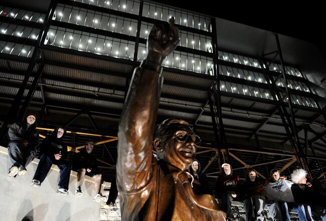 STATE COLLEGE, PA - NOVEMBER 9: Students and those in the community visit the Joe Paterno statue after football head coach Joe Paterno was fired during the Penn State Board of Trustees Press Conference, at Beaver Field, November 9, 2011 in State College, Pennsylvania. Paterno and Spanier have lost their positions amid allegations that former former Penn State defensive coordinator Jerry Sandusky was involved with child sex abuse.  (Photo by Patrick Smith/Getty Images)