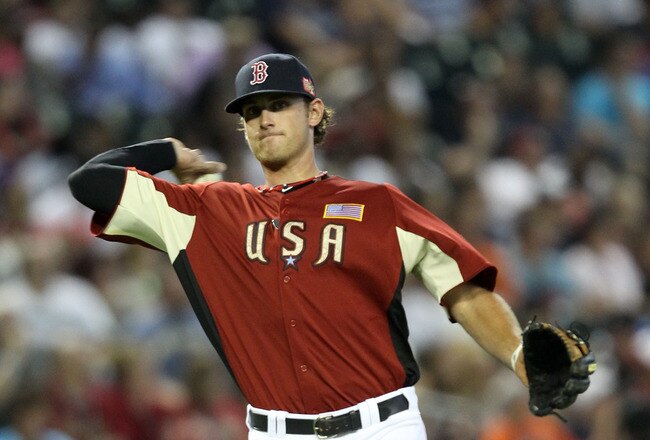 PHOENIX, AZ - JULY 10:  U.S. Futures All-Star Will Middlebrooks #16 of the Boston Red Sox throws the ball to first base during the 2011 XM All-Star Futures Game at Chase Field on July 10, 2011 in Phoenix, Arizona.  (Photo by Christian Petersen/Getty Images)