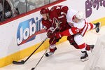 GLENDALE, AZ - APRIL 20:  Kyle Turris #91 of the Phoenix Coyotes battles for the puck with Valtteri Filppula #51 of the Detroit Red Wings in Game Four of the Western Conference Quarterfinals during the 2011 NHL Stanley Cup Playoffs at Jobing.com Arena on April 20, 2011 in Glendale, Arizona.  The Red Wings defeated the Coyotes 6-3 to win the series 4-0.  (Photo by Christian Petersen/Getty Images)