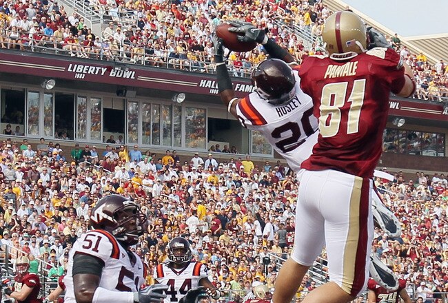 CHESTNUT HILL, MA - SEPTEMBER 25:  Jayron Hosley #20 of the Virginia Tech Hokies intercepts a pass intended for Chris Pantale #81 of the Boston College Eagles as Bruce Taylor #51 of Virginia Tech defends on September 25, 2010 at Alumni Stadium in Chestnut Hill, Massachusetts.  (Photo by Elsa/Getty Images)