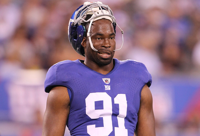 EAST RUTHERFORD, NJ - AUGUST 22: Justin Tuck #91 of the New York Giants in action during their pre season game on August 22, 2011 at The New Meadowlands Stadium in East Rutherford, New Jersey.  (Photo by Al Bello/Getty Images)