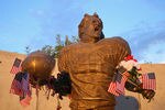 GLENDALE, AZ - SEPTEMBER 11:  Fans adorn the Pat Tillman statue with American flags in honor of the 10 year anniversary of the 9/11 attacks following the NFL season opening game between the Carolina Panthers and the Arizona Cardinals at the University of Phoenix Stadium on September 11, 2011 in Glendale, Arizona.  (Photo by Christian Petersen/Getty Images)