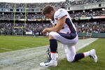 OAKLAND, CA - NOVEMBER 06:  Tim Tebow #15 of the Denver Broncos prays before their game against the Oakland Raiders at O.co Coliseum on November 6, 2011 in Oakland, California.  (Photo by Ezra Shaw/Getty Images)