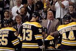BOSTON, MA - OCTOBER 10:  Head coach Claude Julien talks to his players during a time out in the second period against the Colorado Avalanche on October 10, 2011 at TD Garden in Boston, Massachusetts.  (Photo by Elsa/Getty Images)