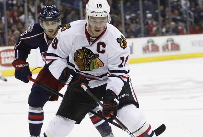 COLUMBUS, OH - NOVEMBER 10:  Jonathan Toews #19 of the Chicago Blackhawks moves the puck up ice during the game against the Columbus Blue Jackets at Nationwide Arena on November 10, 2011 in Columbus, Ohio.  The Blackhawks defeated the Blue Jackets 6-3.  (Photo by John Grieshop/Getty Images)