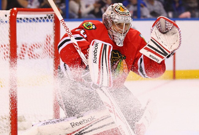 ST. LOUIS, MO - NOVEMBER 8: Corey Crawford #50 of the Chicago Blackhawks makes a save against the St. Louis Blues at the Scottrade Center  on November 8, 2011 in St. Louis, Missouri.  The Blues beat the Blackhawks 3-0.  (Photo by Dilip Vishwanat/Getty Images)