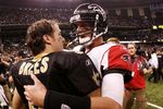 NEW ORLEANS - NOVEMBER 2:  Quarterback Drew Brees #9 of the New Orleans Saints greets quarterback Matt Ryan #2 of the Atlanta Falcons after the Saints 35-27 victory in the game at the Louisiana Superdome on November 2, 2009 in New Orleans, Louisiana. (Photo by Chris Graythen/Getty Images)